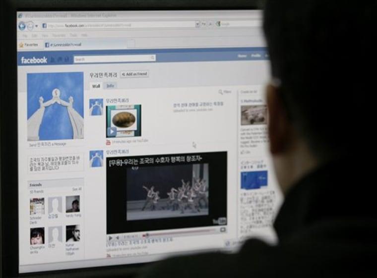 A South Korean journalist looks at a computer screen showing an alleged North Korean Facebook account which carries content condemning \"warmongers\" South Korea and the U.S. in Seoul, South Korea, Friday, Aug. 20, 2010.  Reclusive North Korea appears to have added Facebook to the list of social network services it has recently joined to ramp up its propaganda war against South Korea and the U.S. (AP Photo/Ahn Young-joon)